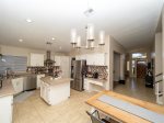 Kitchen w/ stainless steel appliances and open dining area